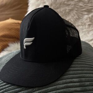 Fabletics Black Trucker Hat with White Wing Logo